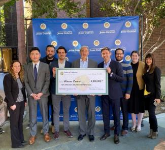 Assemblymember Gabriel presents the novelty check symbolizing the recent appropriation in the state budget of $2 million towards the Warner Center Transportation Technology Infrastructure and Innovation Zone.