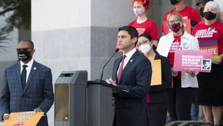 Asm Gabriel at press conference speaking out against the judicial decision to strike down California’s 30 year-old ban on assault weapons