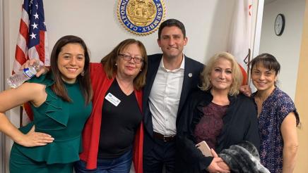 The Assemblymember, staff, and West Hills residents pose for a photograph