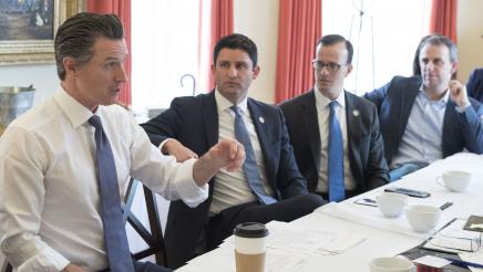 Assemblymember Gabriel listens as Governor Newsom speaks with the California Legislative Jewish Caucus